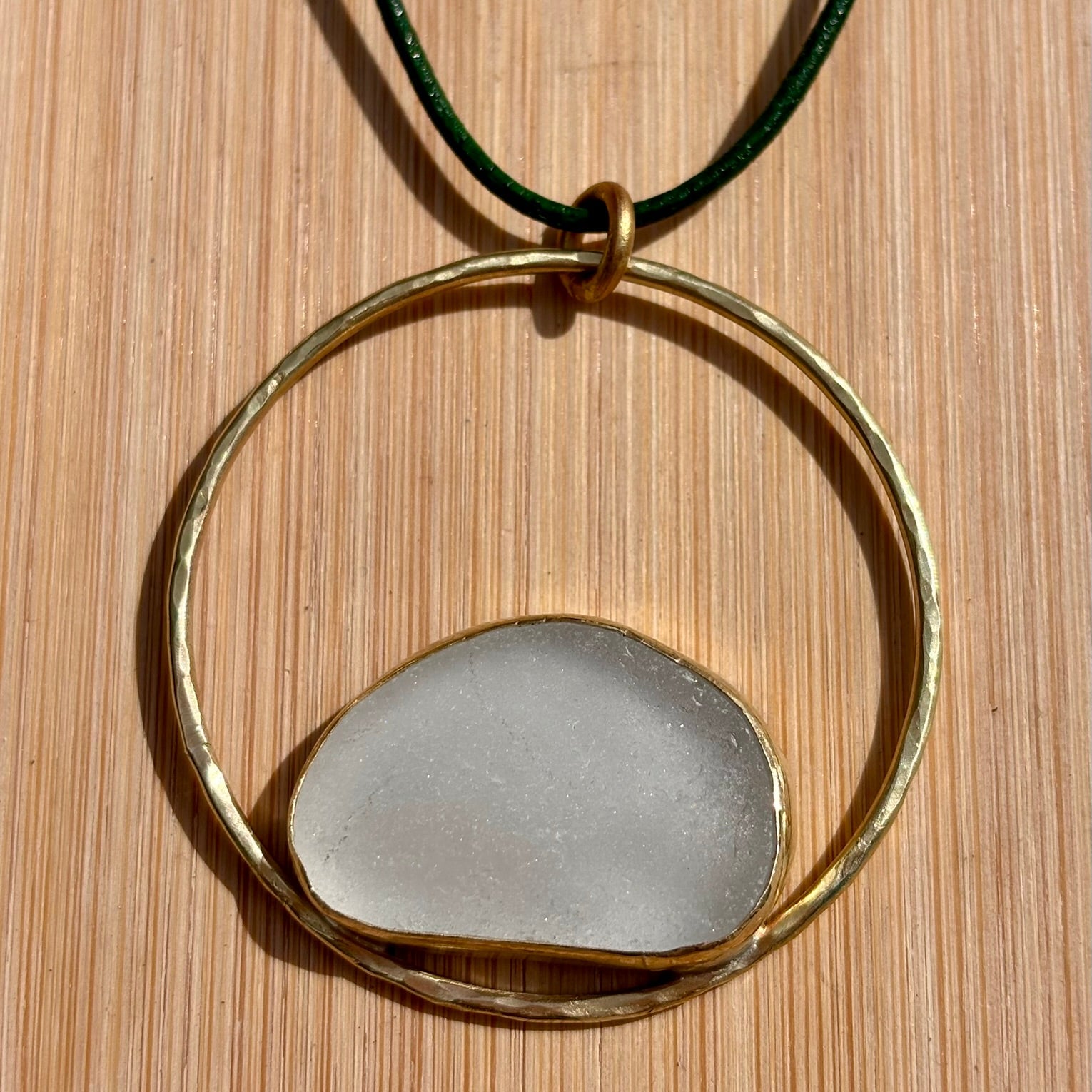 Rowan Berry Jewellery copper or brass hoop necklace with bezel set Carnoustie sea glass on an adjustable leather cord