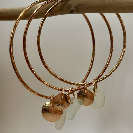 Handmade bronze bangles by Rowan Berry Jewellery with genuine sea glass collected from beaches around Carnoustie