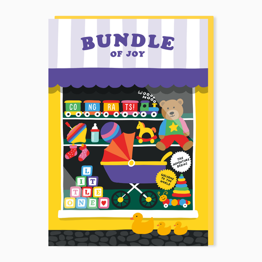 Bundle of Joy new baby card by Stoats & Weasels featuring a colourful toy shop window illustration