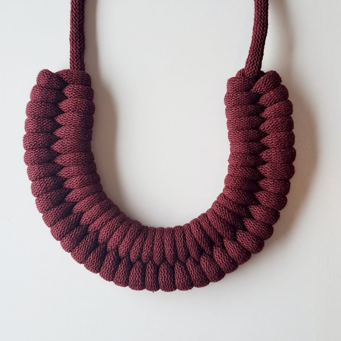 Ragged House large recycled cotton macrame cord knot necklace with figure 8 bow-shaped statement design