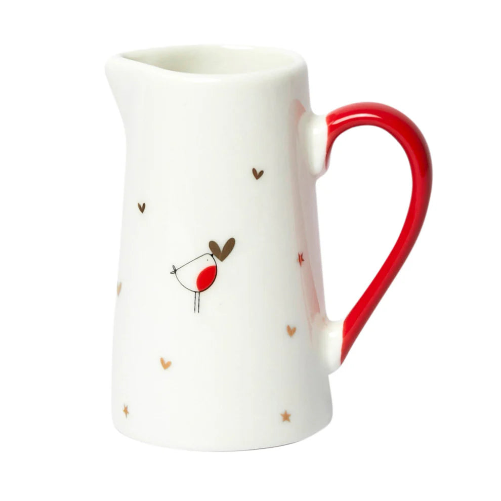 Small fine bone china jug with a decorative robin design, metallic gold  details and red handle. 