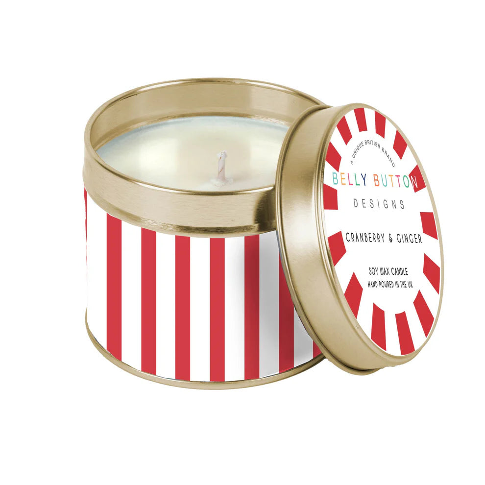 Round metal soy wax candle with red and white stripes design.