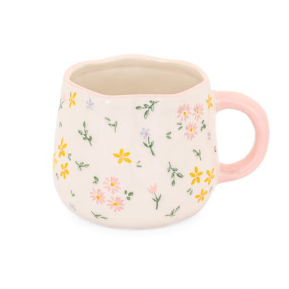 A white ceramic mug with an intricate, small-scale 'Ditsy Floral' pattern, approximately 10cm wide and 13cm high.