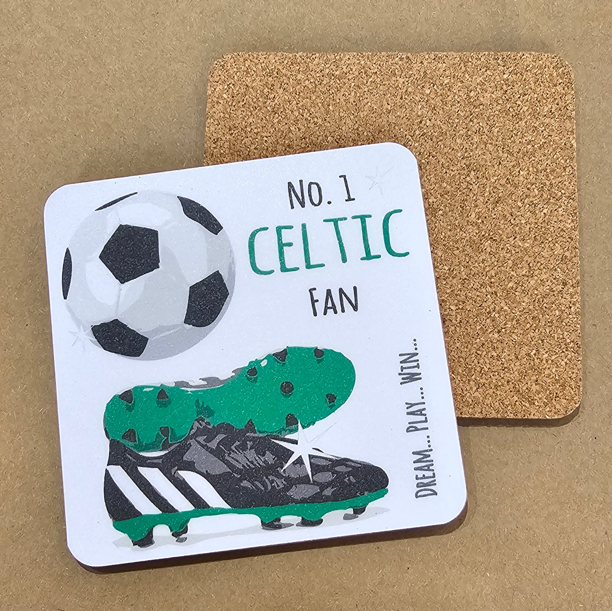 A square coaster with a cork base, featuring a football design with the text 'NO. 1 CELTIC FAN' and an image of a soccer ball and cleats.
