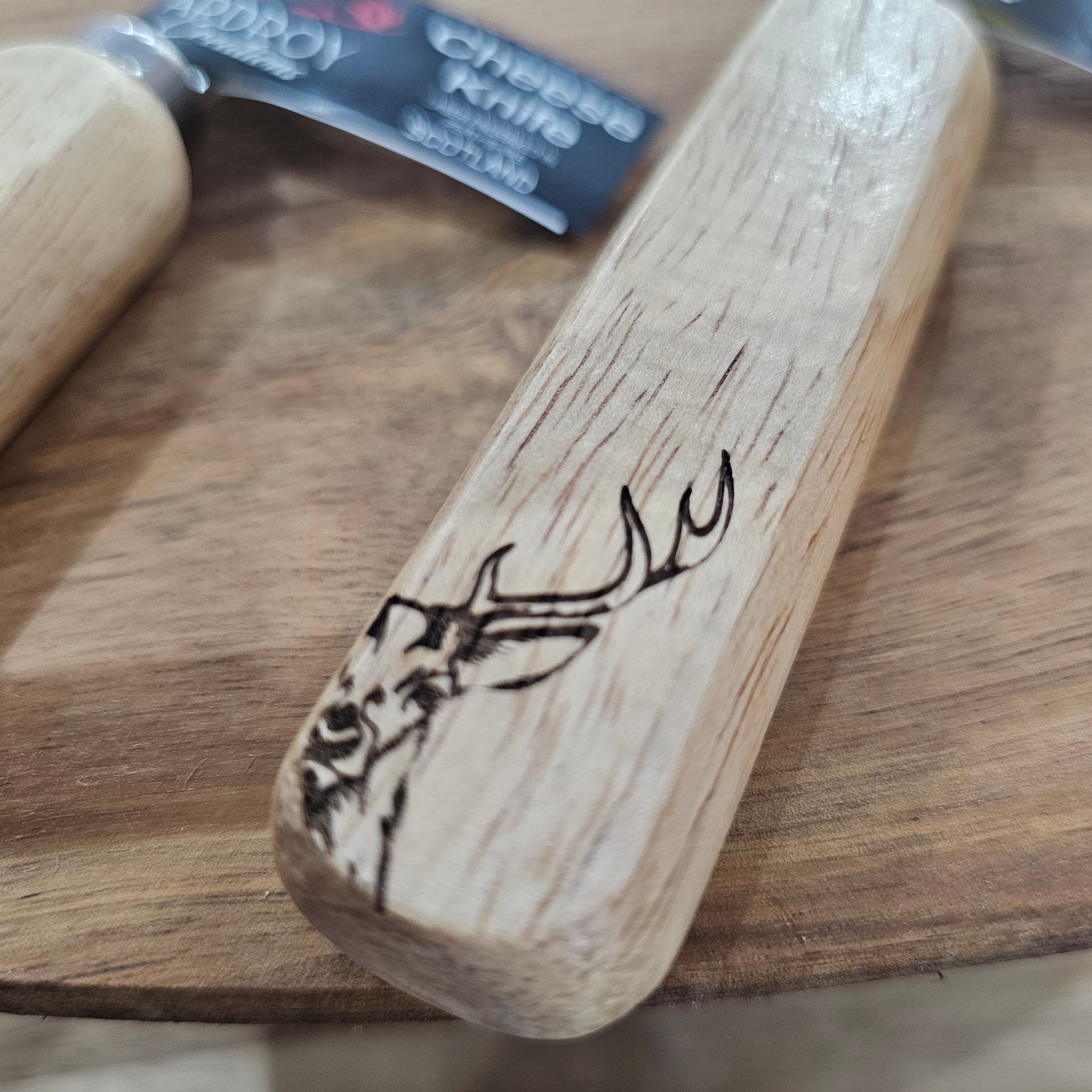 Scottish wooden handle cheese knife by Ardroy Creations with stainless steel blade in Stag design