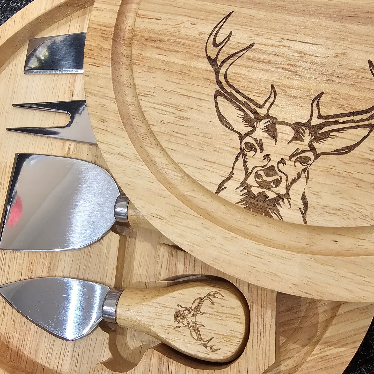 Round Hevea wood cheese serving set by Ardroy Creations with swivel opening and four specialised cheese knives