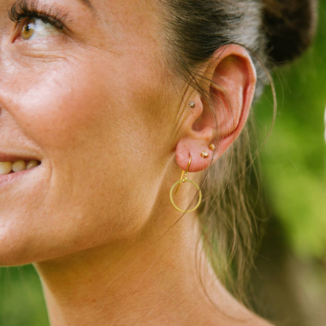 Gold-plated open circle earrings from the Copper Bee Simplicity Collection, handcrafted in the UK