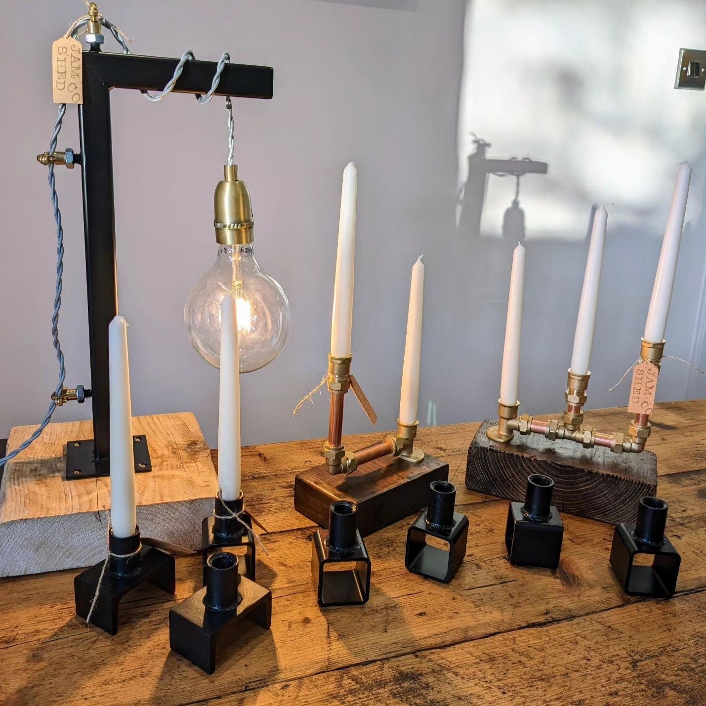 Collection of Black Satin Steel Candle Holders and Lamp by Jam Shed Co