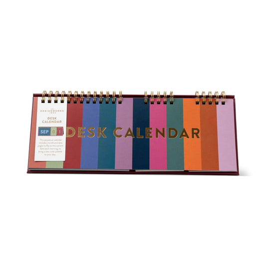 Designworks Ink Colourblock perpetual desk calendar with bold coloured pages and a freestanding A-frame design