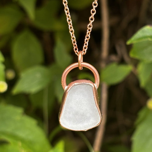 Copper bezel set white sea glass necklace by Rowan Berry Jewellery handmade in Carnoustie with locally collected sea glass