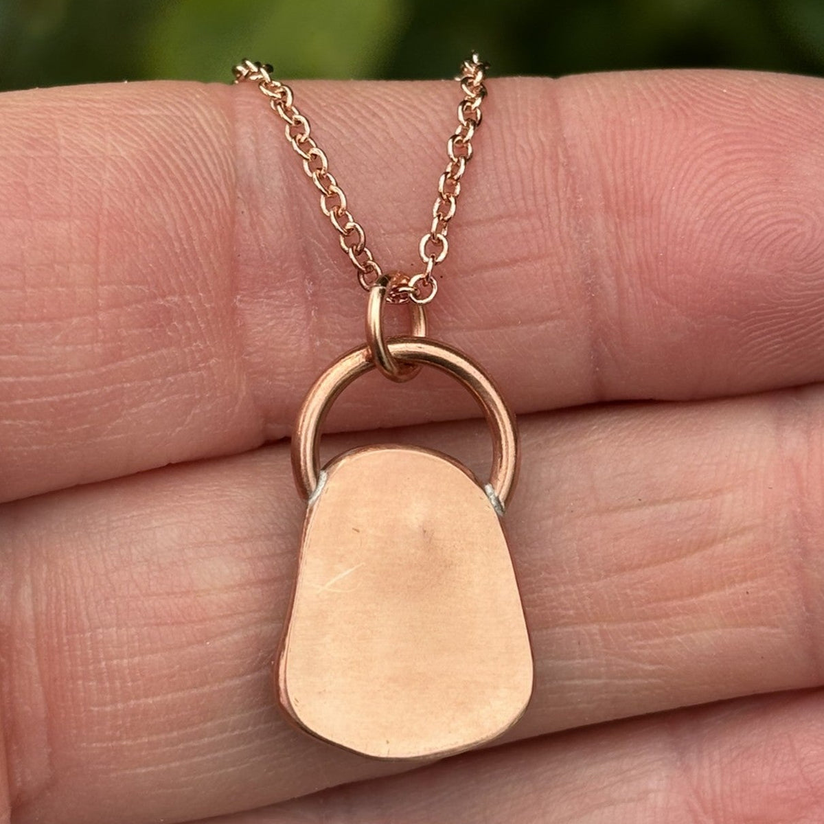 Copper bezel set white sea glass necklace by Rowan Berry Jewellery handmade in Carnoustie with locally collected sea glass