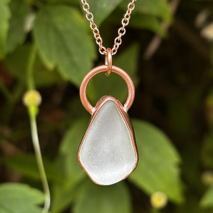 Copper bezel set white sea glass necklace by Rowan Berry Jewellery handmade in Carnoustie with locally collected sea glass