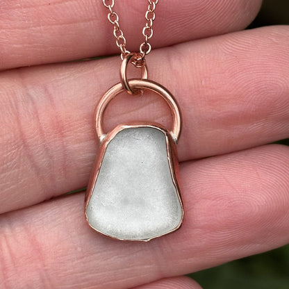 Copper bezel set white sea glass necklace by Rowan Berry Jewellery handmade in Carnoustie with locally collected sea glass