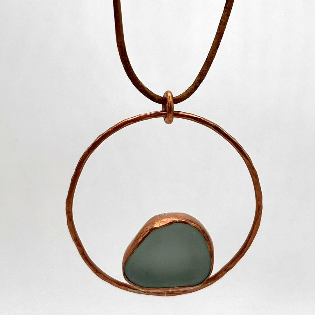 Rowan Berry Jewellery copper or brass hoop necklace with bezel set Carnoustie sea glass on an adjustable leather cord