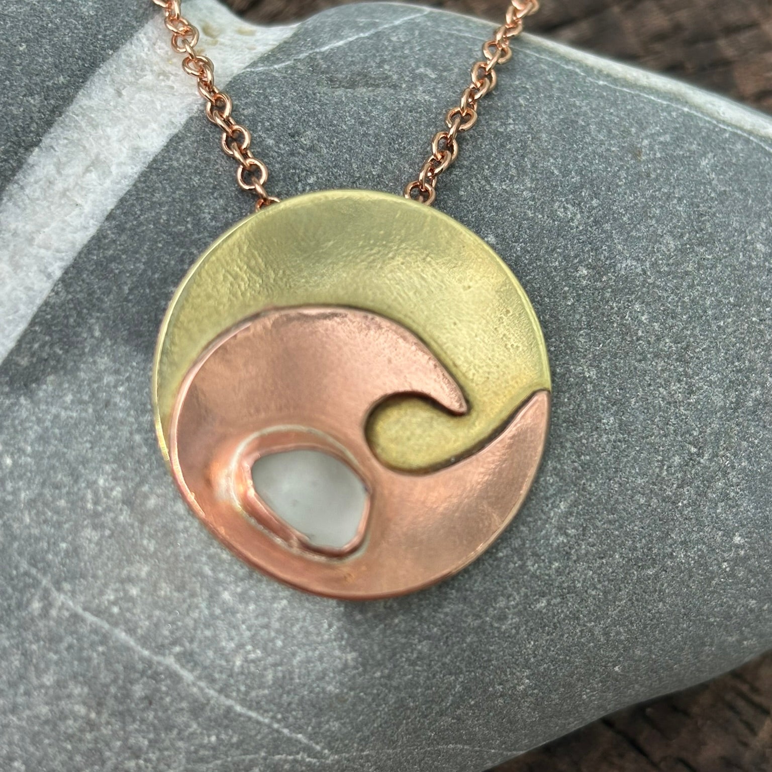 Copper wave and brass circle necklace by Rowan Berry Jewellery with genuine sea glass collected from Carnoustie beaches