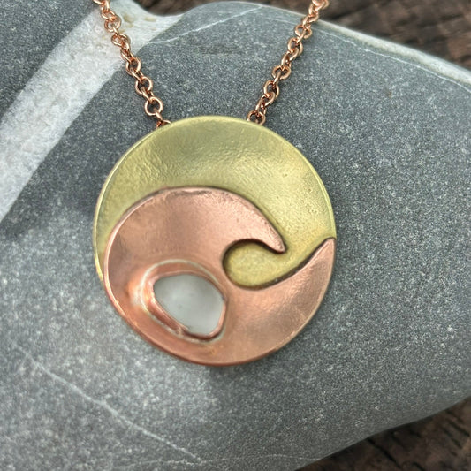 Copper wave and brass circle necklace by Rowan Berry Jewellery with genuine sea glass collected from Carnoustie beaches