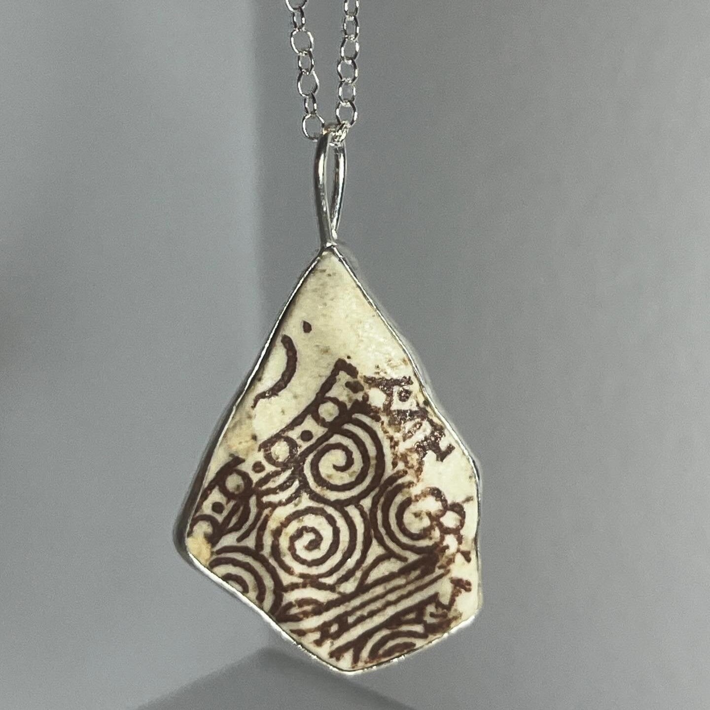 Sterling silver and cream/brown sea pottery pendant necklace handmade in Dundee with unique shape 