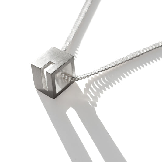 CORNER CUT OUT CUBE PENDANT