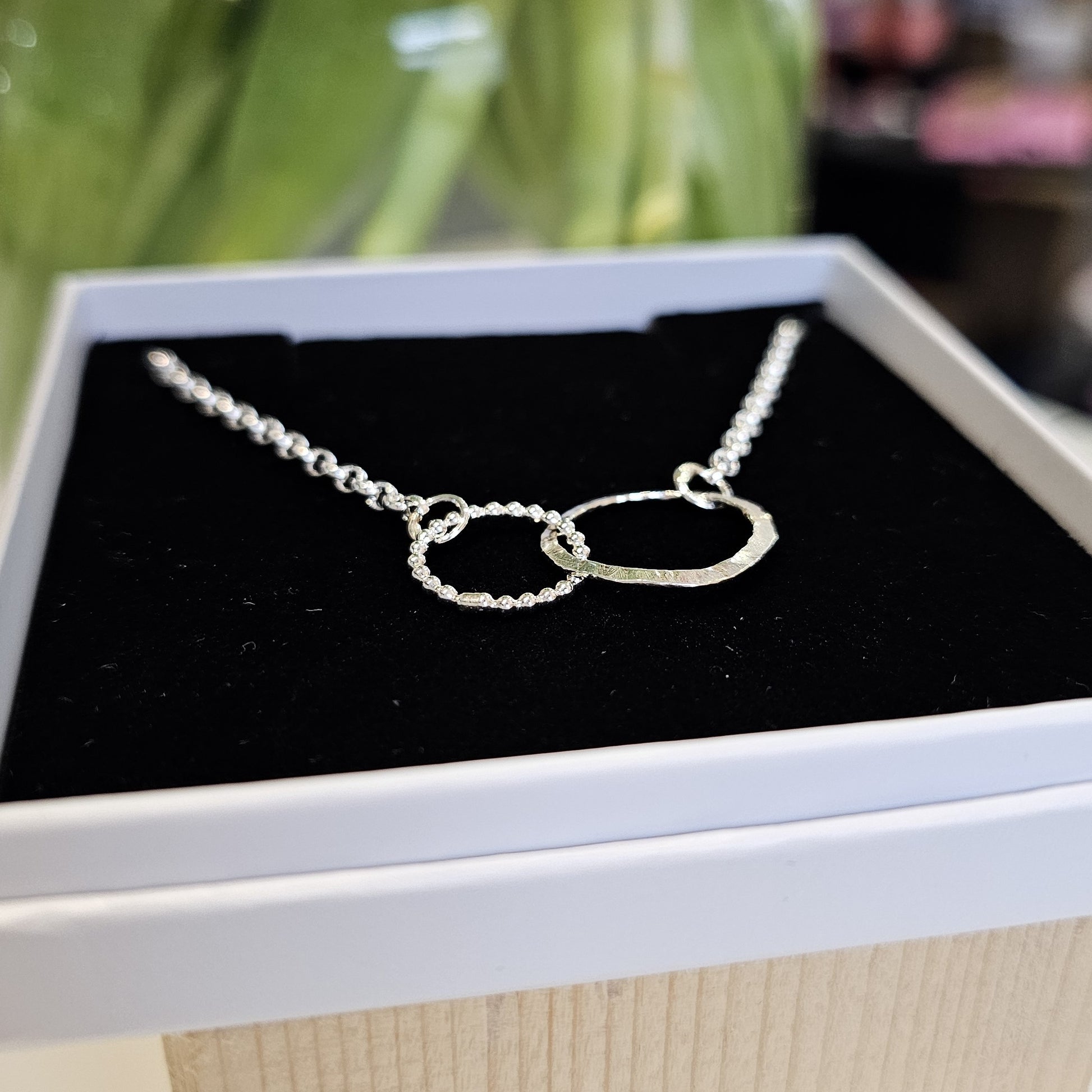 Sterling silver double circle necklace by Diana King handmade in Perthshire