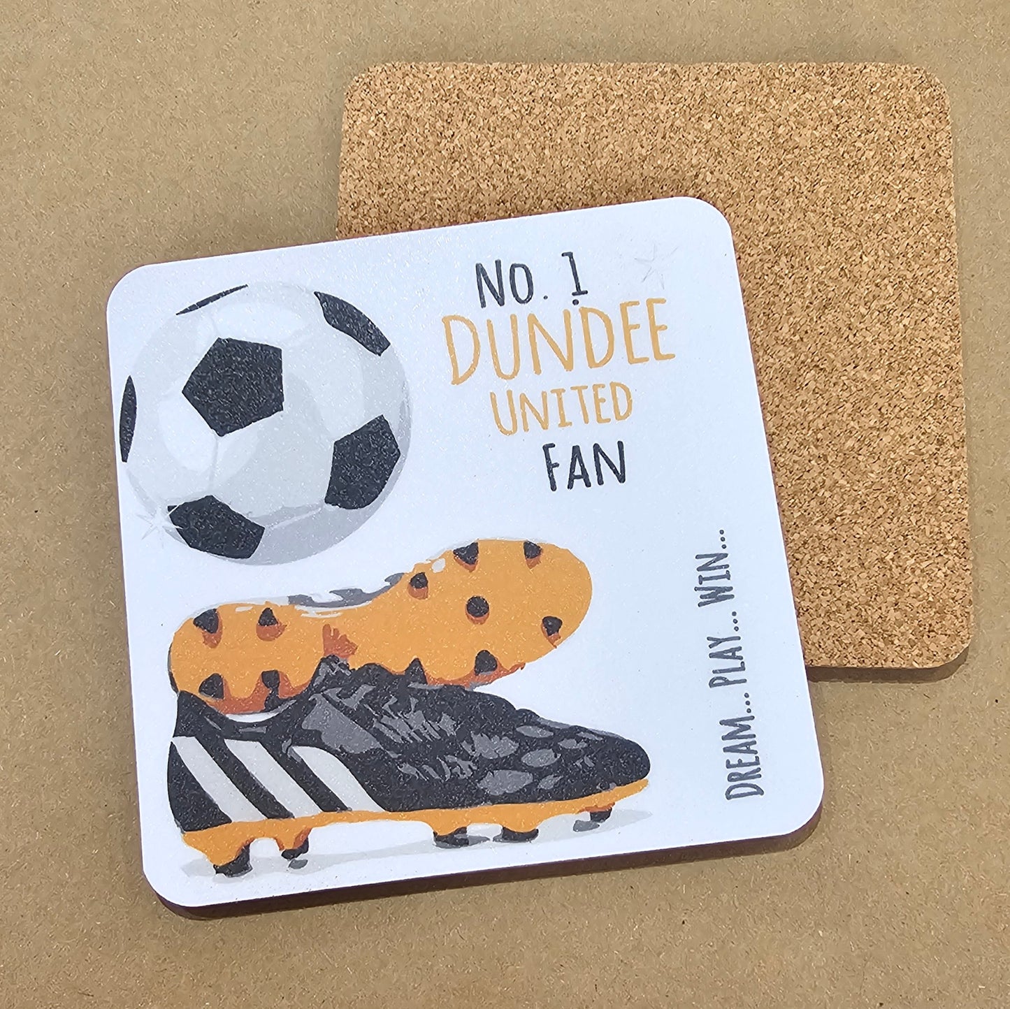A square coaster with a cork base, featuring a football design with the text 'NO. 1 DUNDEE UNITED FAN' and an image of a soccer ball and cleats.