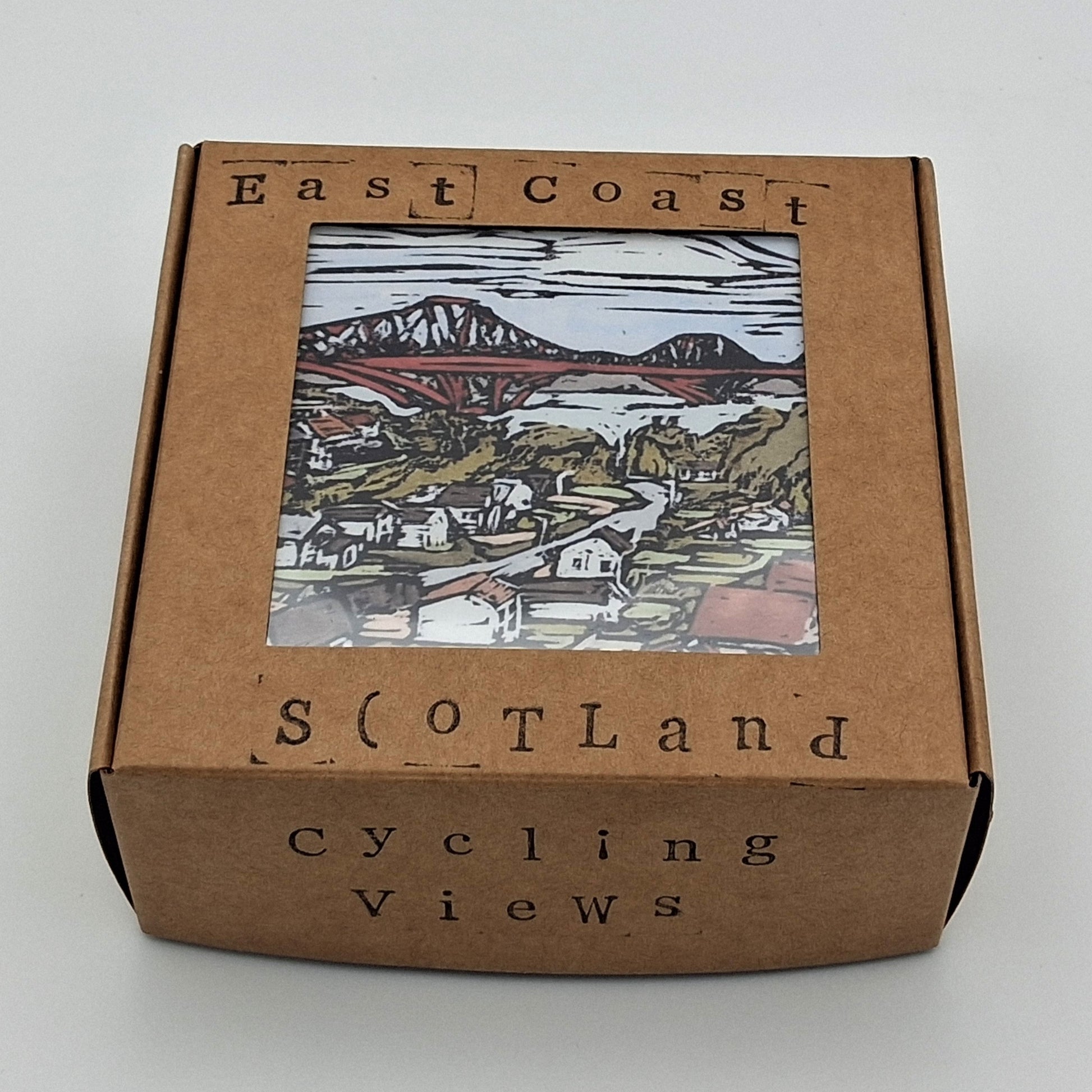 A set of four 'East Coast Scotland' square hardwood coasters, each displaying a different colourful print with BeeBirds' signature artwork, presented in a gift box.