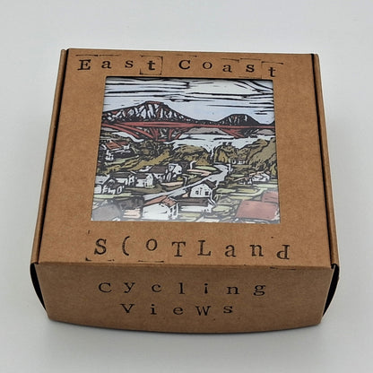A set of four 'East Coast Scotland' square hardwood coasters, each displaying a different colourful print with BeeBirds' signature artwork, presented in a gift box.