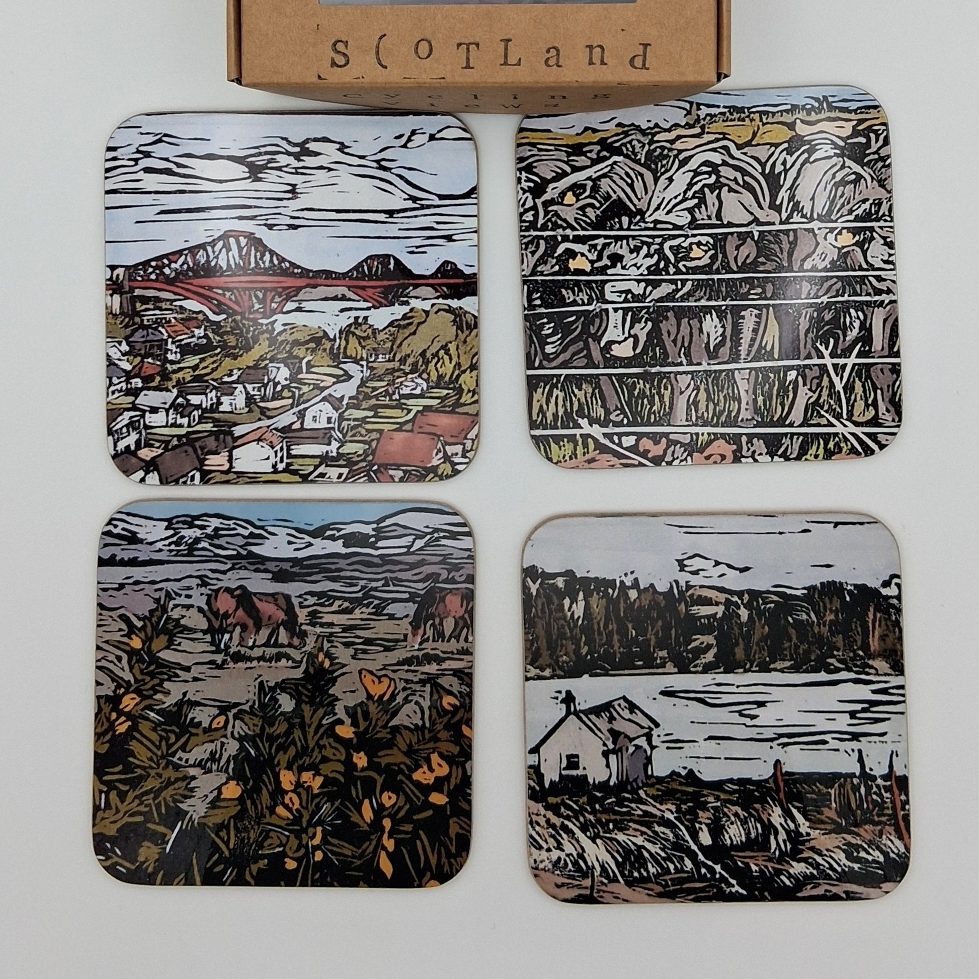 A set of four 'East Coast Scotland' square hardwood coasters, each displaying a different colourful print with BeeBirds' signature artwork, presented in a gift box.
