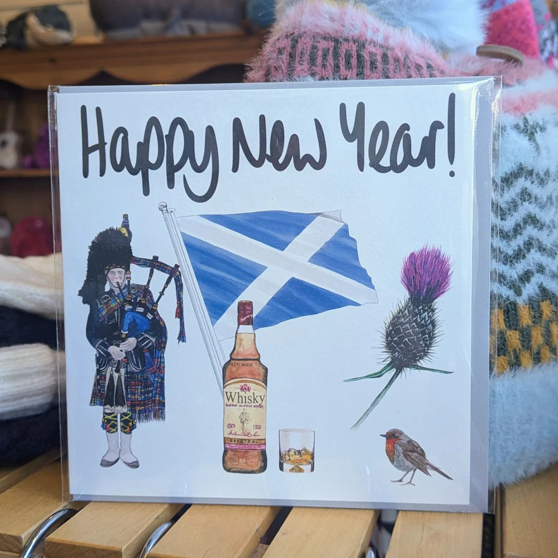 Scottish Card - Flag, Piper, Whisky, Thistle and Robin with 'Happy New Year! by F&B