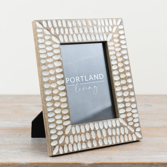 Fingerprint wooden photo frame with natural wood finish designed to fit a 5 x 7 inch photograph