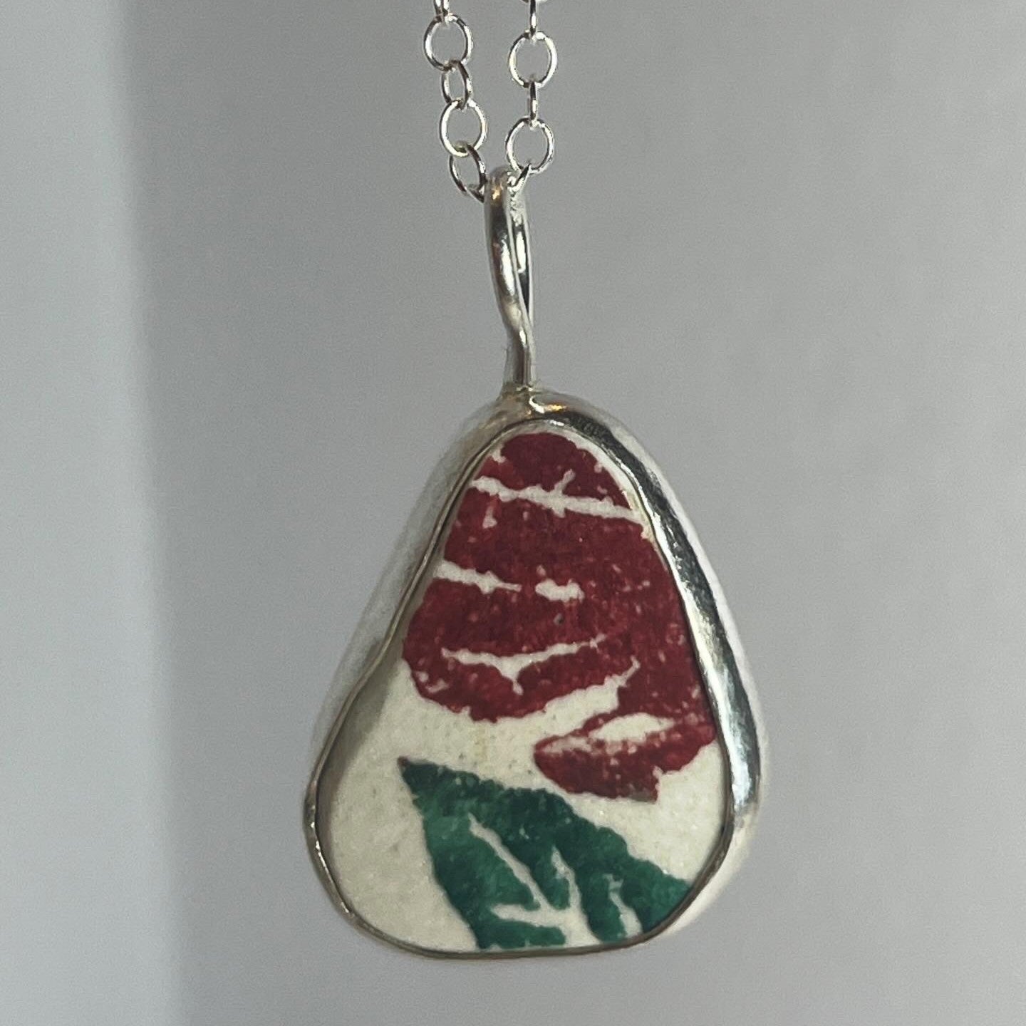 Sterling silver and white/red/green floral sea pottery pendant necklace handmade in Dundee with unique triangle shape 