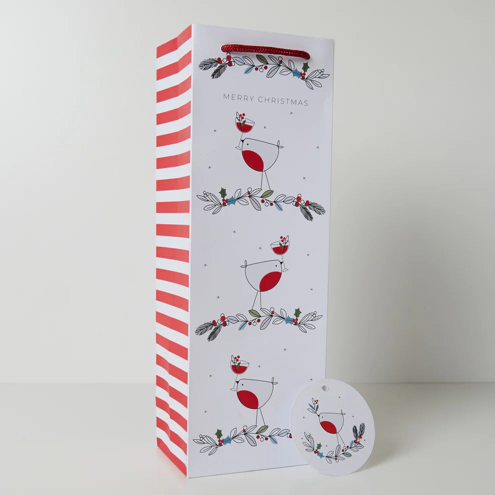 A luxury eco-friendly bottle bag with a Belly Button Design, woven paper handles and gift tag.