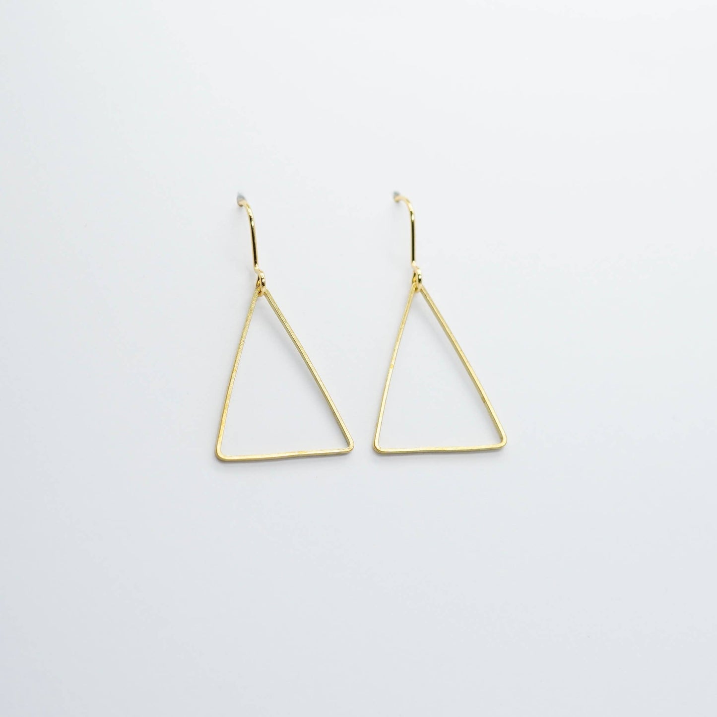 Copper Bee Simplicity Collection open brass triangle geometric earrings with gold-plated hooks