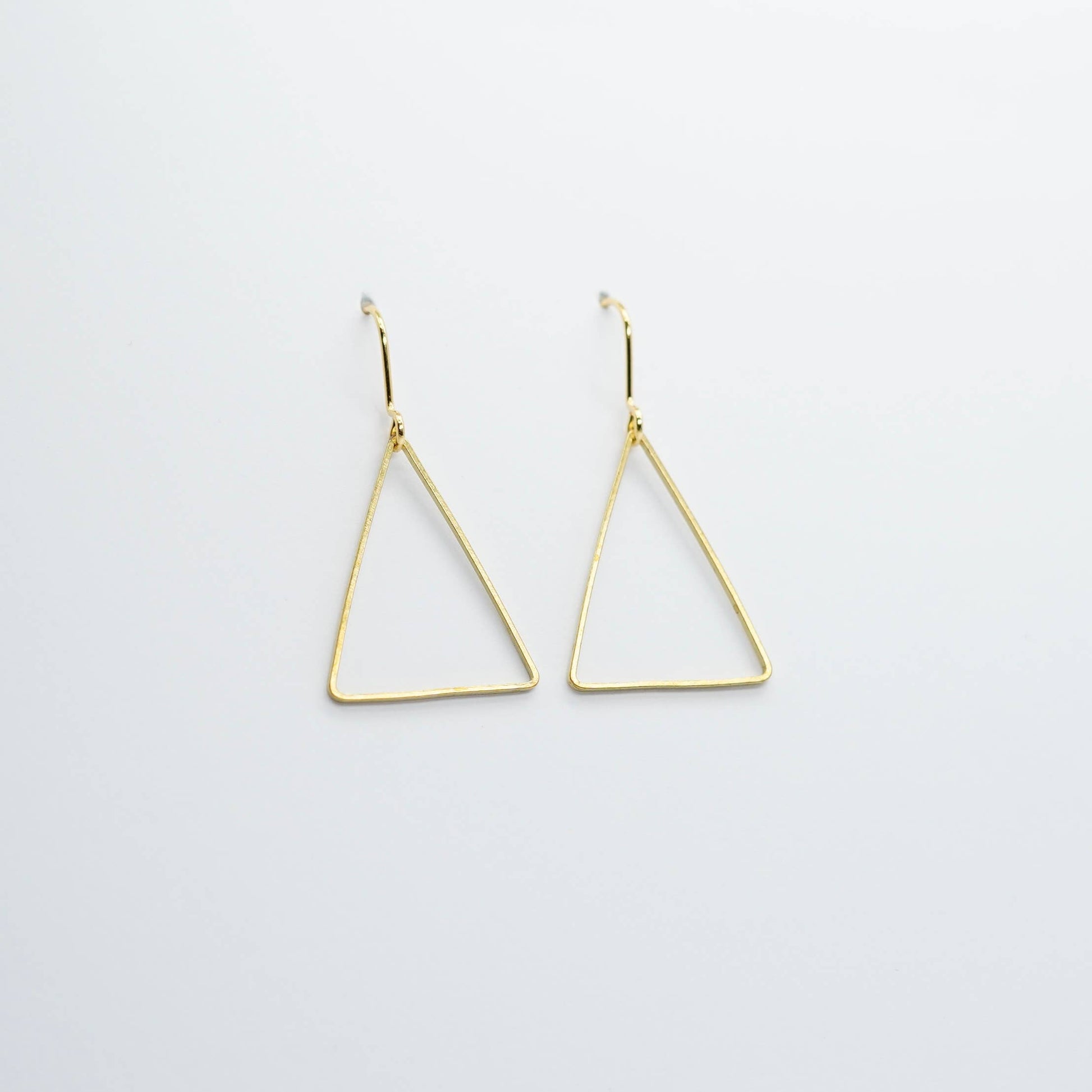 Copper Bee Simplicity Collection open brass triangle geometric earrings with gold-plated hooks