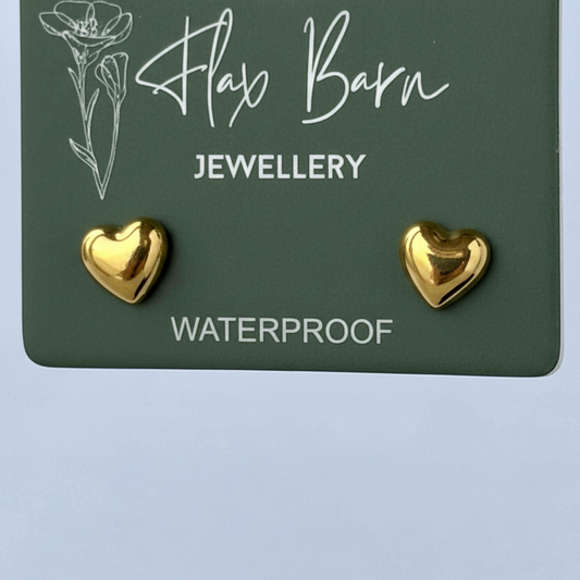 Flax Barn heart-shaped stud earrings crafted from tarnish-resistant, waterproof PVD-plated stainless steel.