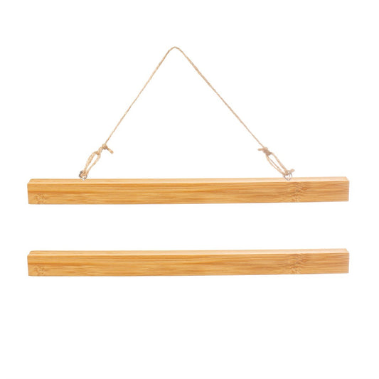 Wooden poster display hanger secured by magnetic clasps, holding a piece of artwork or photograph. The frame measures 22cm long.