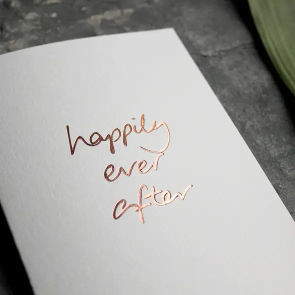 Happily Ever After A6 wedding card with rose gold foil, hand-printed on 360gsm Fedrigoni card, blank inside, matching envelope included