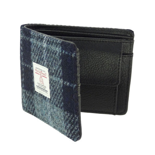 Compact Harris Tweed wool wallet purse with polyester lining, compartments for coins, credit cards and banknotes, measuring 11 x 9 x 3cm.