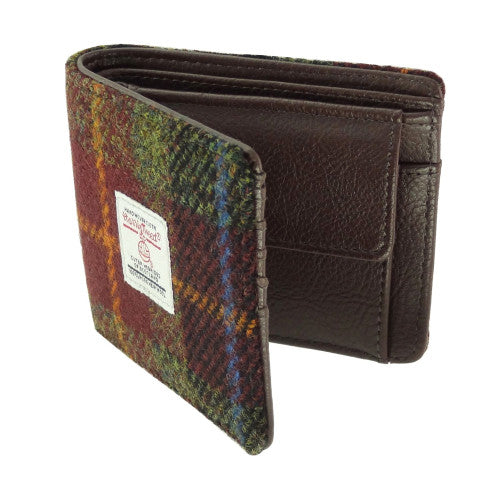 Compact Harris Tweed wool wallet purse with polyester lining, compartments for coins, credit cards and banknotes, measuring 11 x 9 x 3cm.