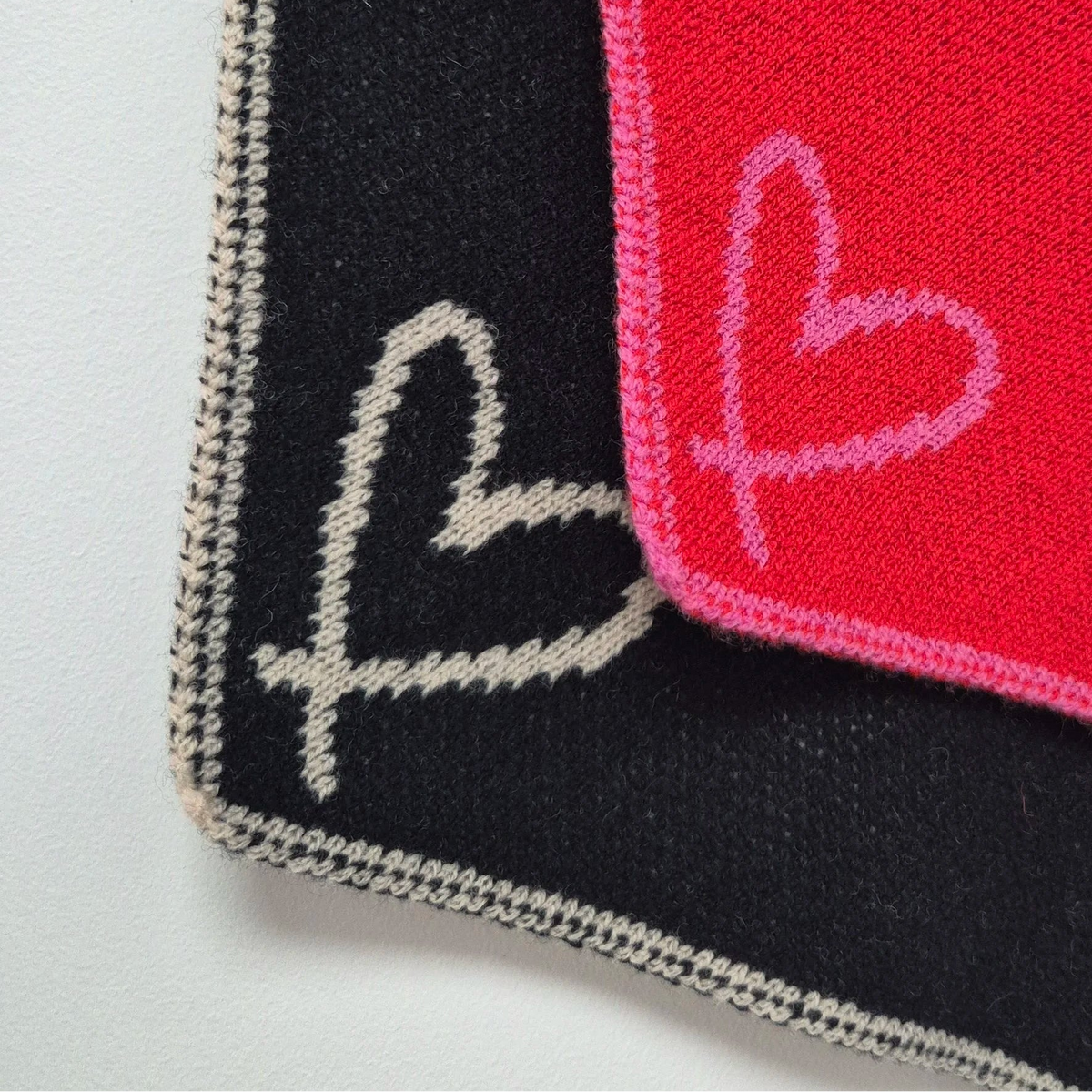 Jo-AMI lambswool neckerchiefs blakc or red with oatmeal or pink heart and trim, knitted and hand finished in Dundee Scotland