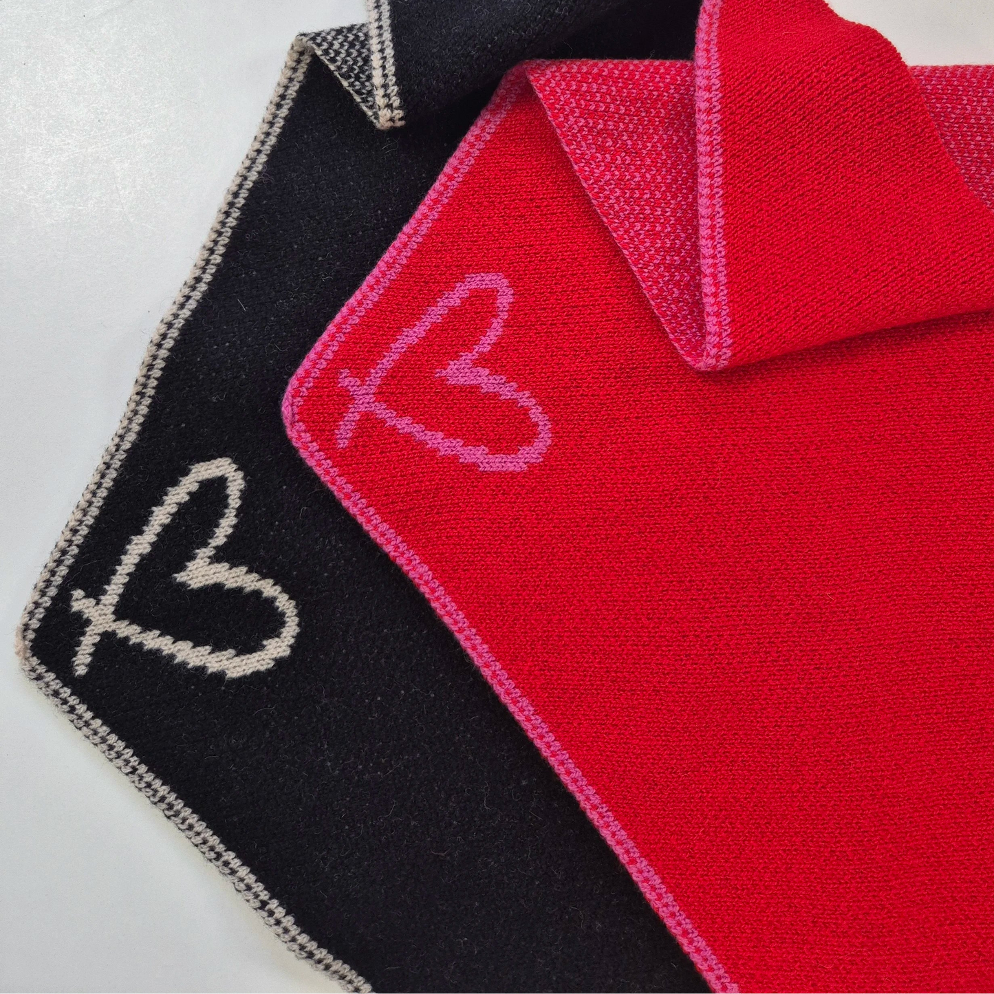 Jo-AMI lambswool neckerchiefs blakc or red with oatmeal or pink heart and trim, knitted and hand finished in Dundee Scotland