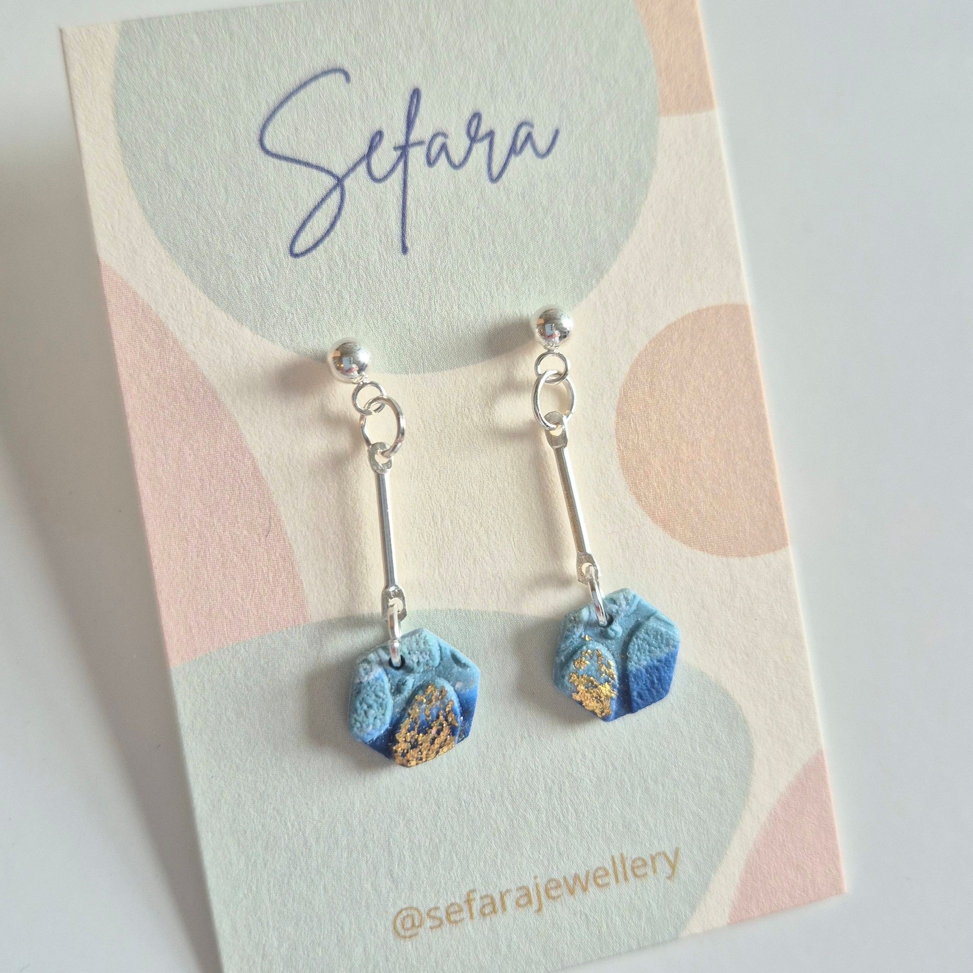 Sefara Jewellery hexagonal drop earrings with gold leaf detail, handmade in Scotland and inspired by the Scottish coastline