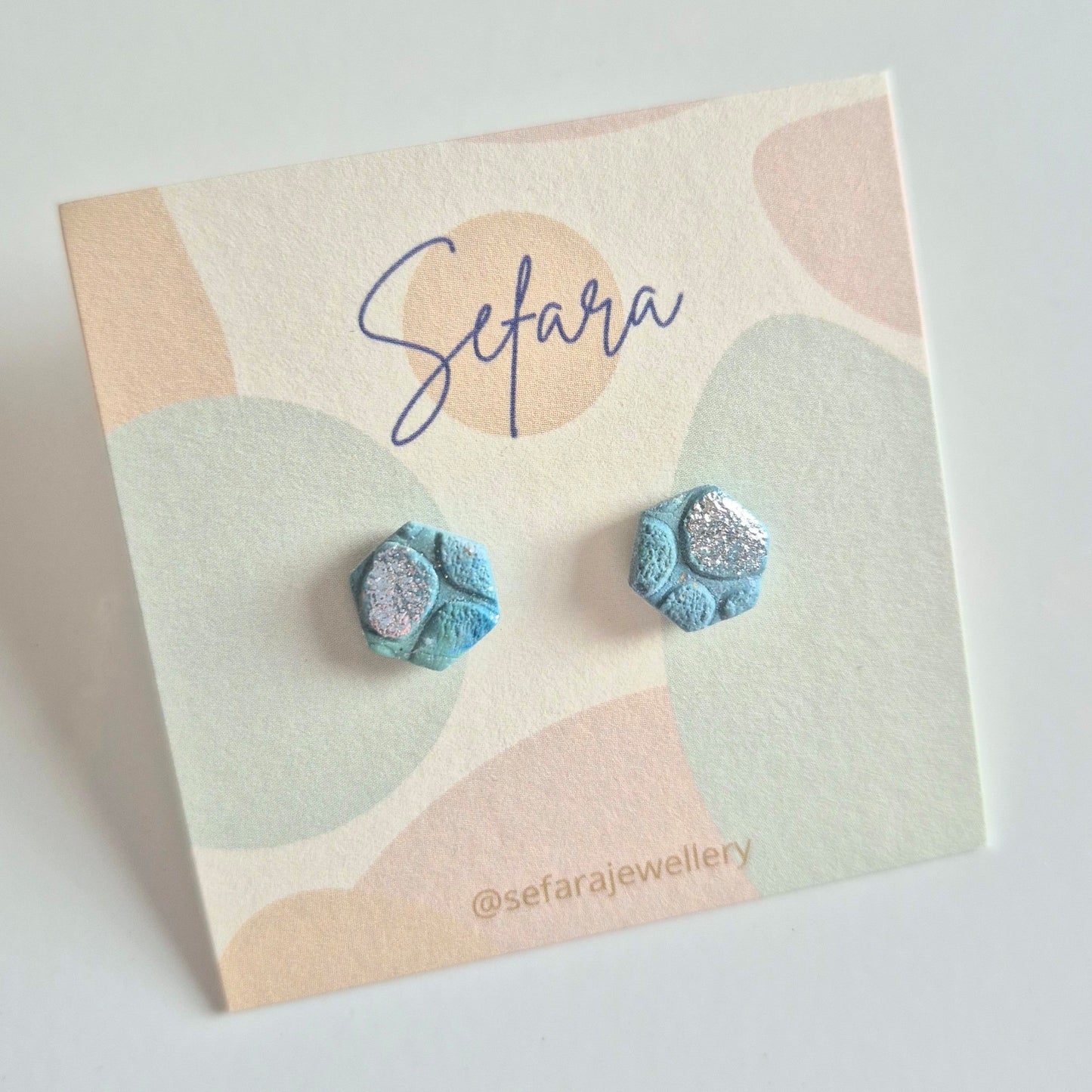 Sefara Jewellery hexagonal polymer clay stud earrings with silver leaf detail, handmade in Scotland