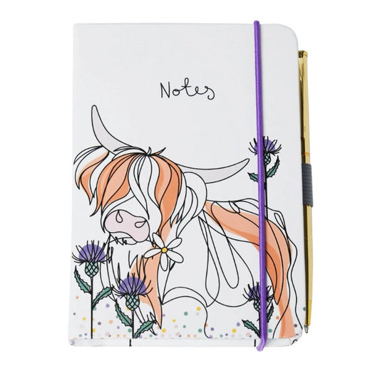 Highland Cow A6 pocket notebook by Belly Button Designs with textured cover, gold pen and lined pages