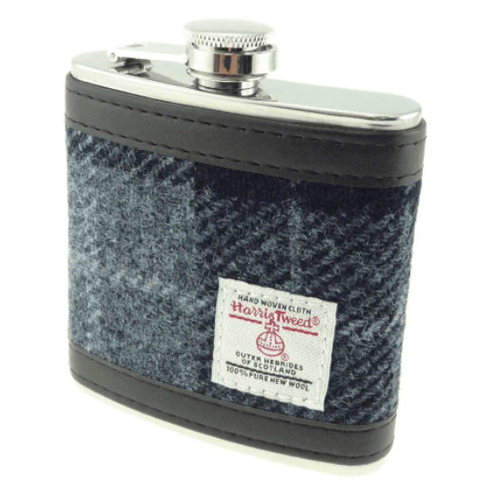 Harris Tweed stainless steel hip flasks with 6oz capacity, available in various tartan and checked fabric designs, presented in black gift boxes.