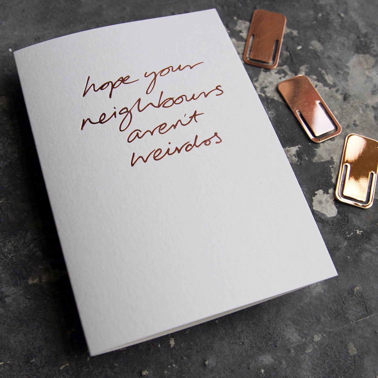 Hope Your Neighbours Aren’t Weirdos A6 new home card with rose gold foil, hand-printed on 360gsm Fedrigoni card