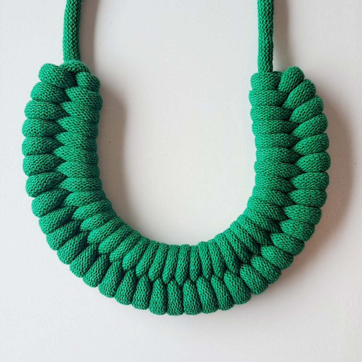 Ragged House large recycled cotton macrame cord knot necklace with figure 8 bow-shaped statement design