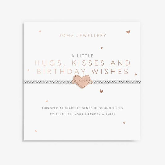 A silver plated stretch beaded bracelet with a rose-gold plated heart charm, presented on a card that reads 'A Little HUGS, KISSES AND BIRTHDAY WISHES'.