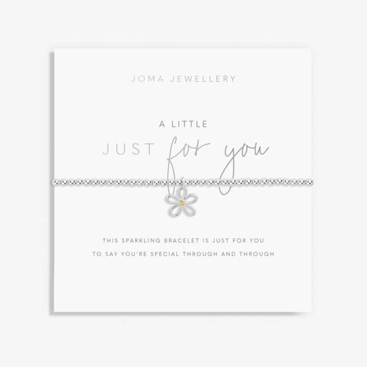 A silver bracelet with a small decorative flower charm, presented on a card that reads 'A Little JUST FOR YOU' and 'This sparkling bracelet is just for you to say you're special through and through'.