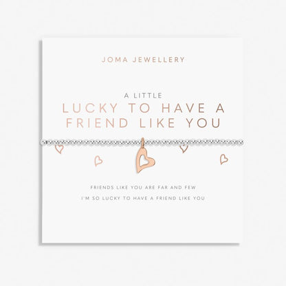 A silver bracelet with rose gold plated elements, presented on a card that reads 'A LITTLE LUCKY TO HAVE A FRIEND LIKE YOU'.