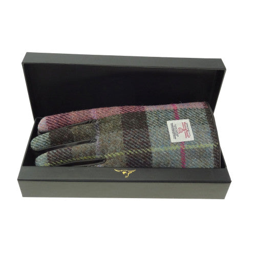 Ladies Harris Tweed and genuine leather contrast gloves in assorted tartan and checked designs, size Large, presented in a gift box.